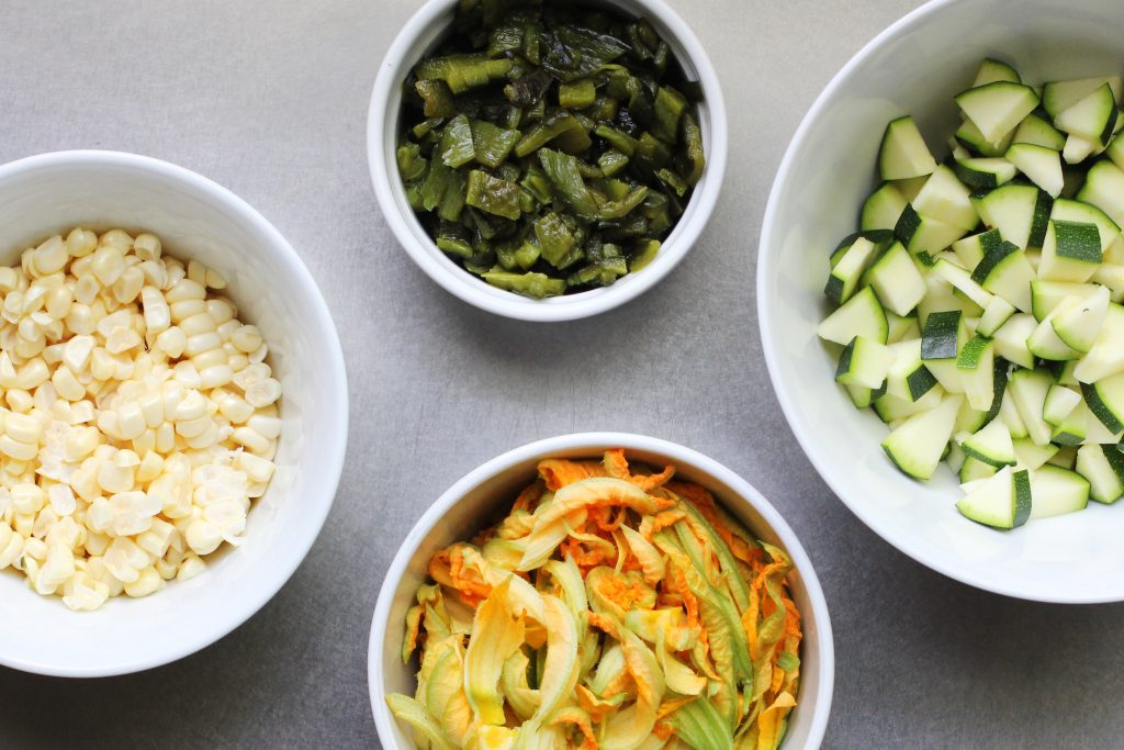 Roasted Poblano, Sliced Zucchini, Slivered Squash Blossom, Corn Kernals.