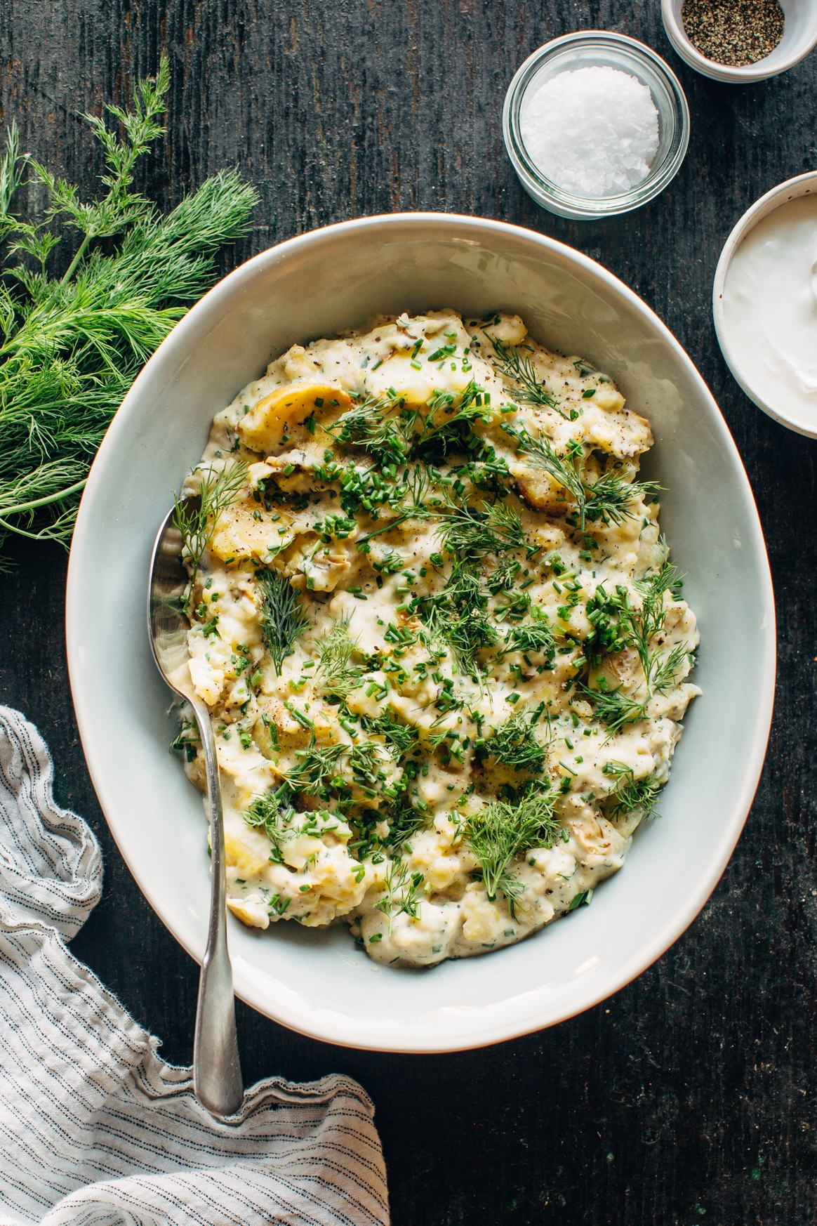 Smashed Grilled Potatoes with Garlic, Labneh, and Herbs