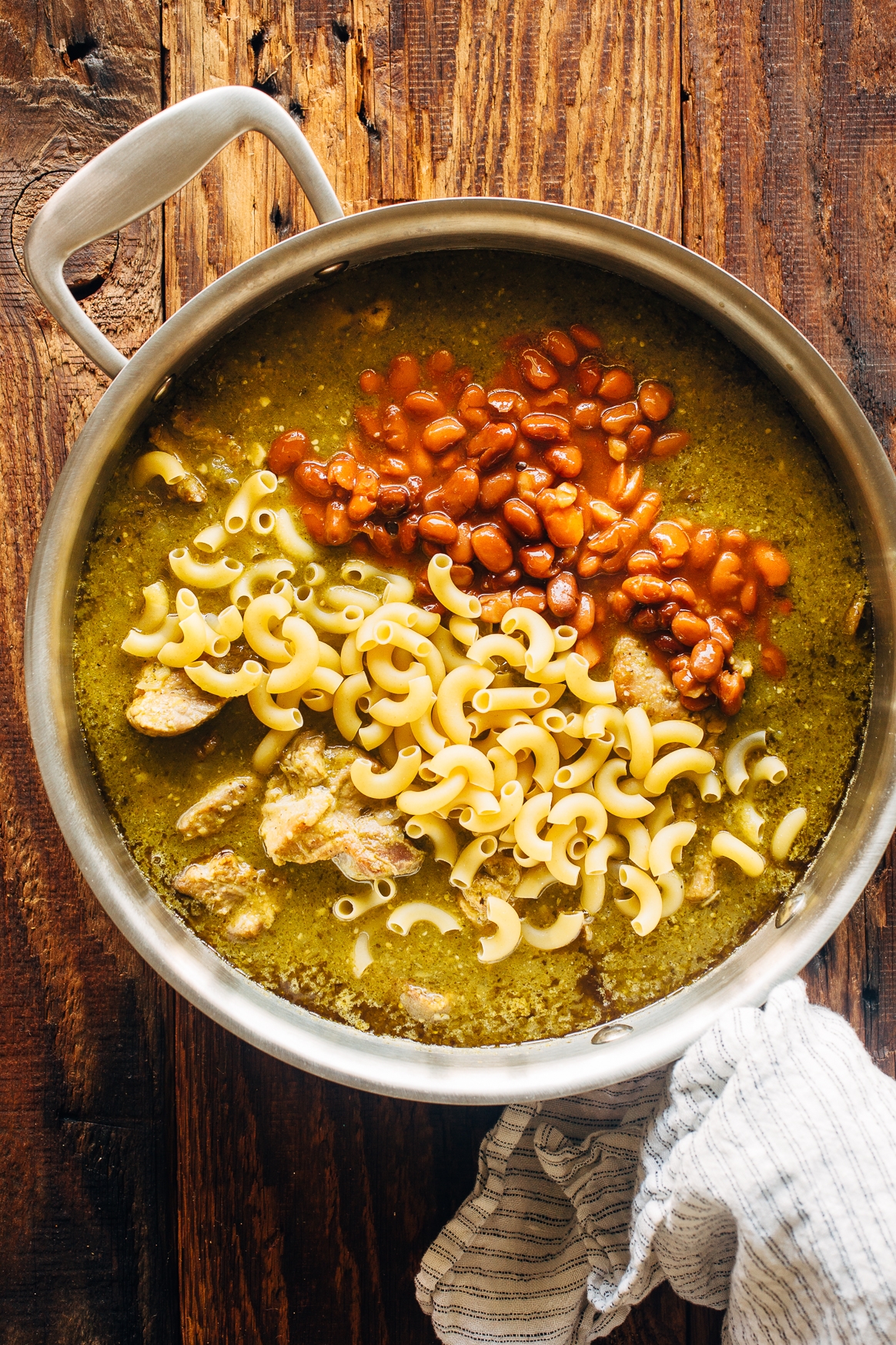 Adding Macaroni and Beans to Chile Verde