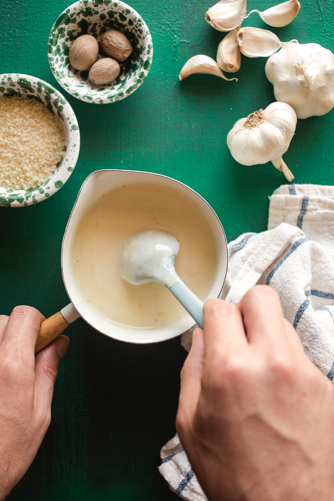 Stirring Alfredo Sauce